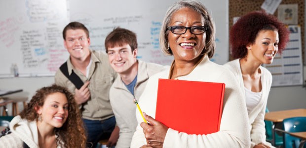 High school teacher with students in class